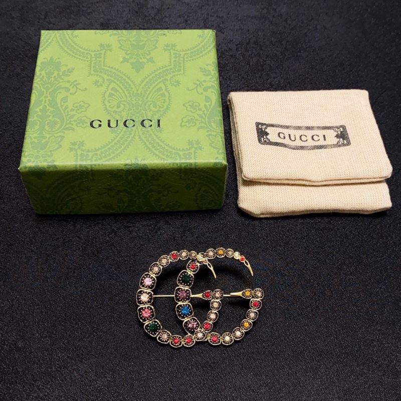 Gvc*1 brooches